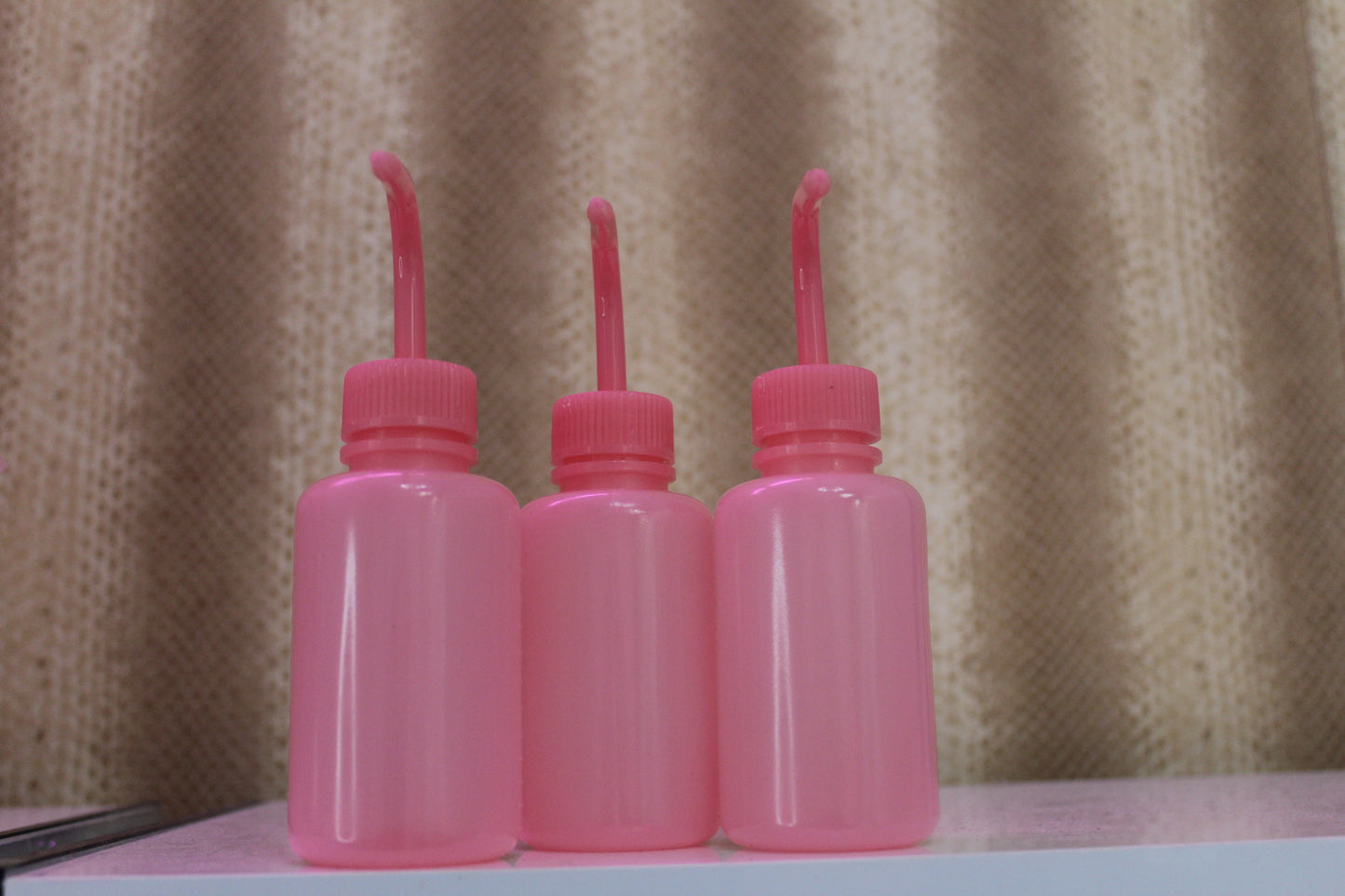 Pink Rinse Bottle